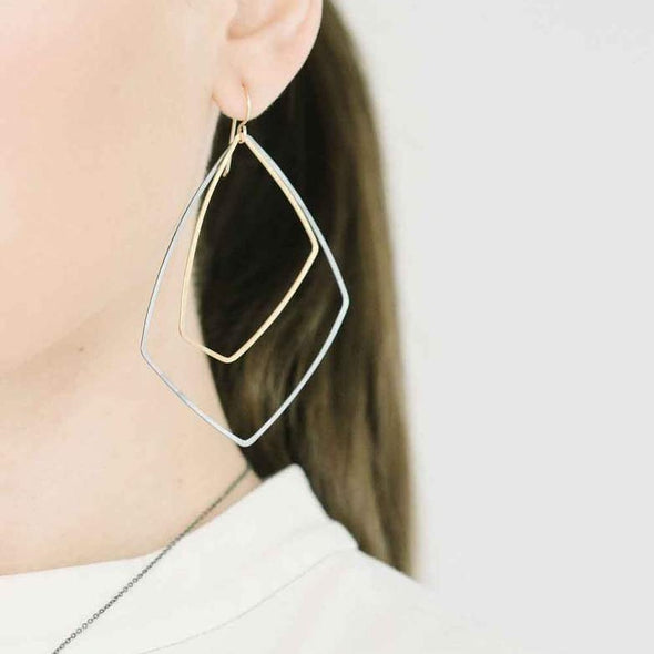 Earrings: Akara in Silver + Gold